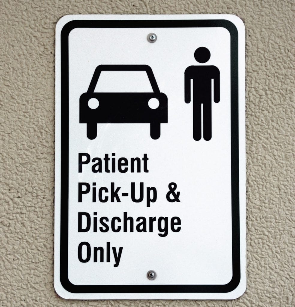 sign says patient pick up and discharge only
