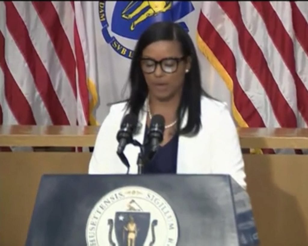 Photo: Raquel Quezada speaking at Governor's press conference.
